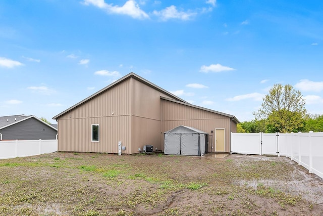 420 Sandmar Dr, Ripon, WI 54971 - view of outbuilding with a fenced backyard and central air condition unit