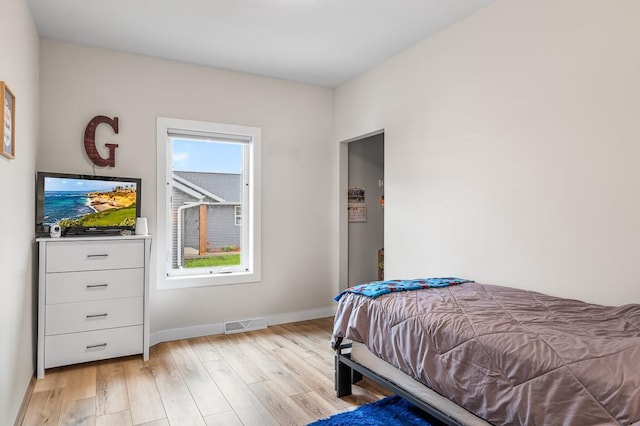 420 Sandmar Dr, Ripon, WI 54971 - bedroom with light wood finished floors and baseboards