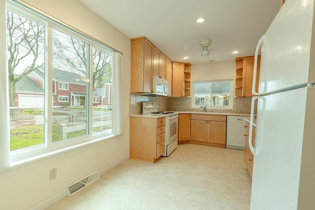 1 Winterberry Trl, Madison, WI 53717 - kitchen featuring white appliances, open shelves, plenty of natural light, tasteful backsplash, and recessed lighting