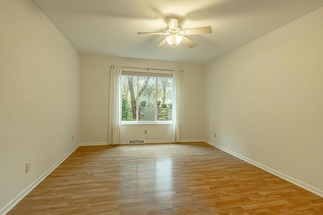1 Winterberry Trl, Madison, WI 53717 - spare room with ceiling fan, baseboards, and light wood-style flooring