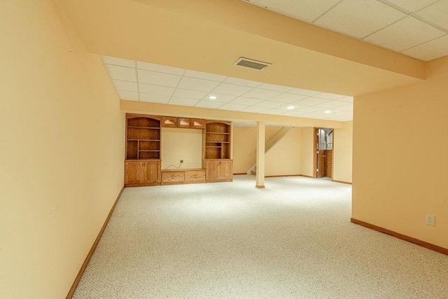1 Winterberry Trl, Madison, WI 53717 - finished basement featuring a drop ceiling, baseboards, built in features, carpet, and recessed lighting