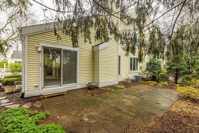 1 Winterberry Trl, Madison, WI 53717 - back of property featuring a patio area and central AC