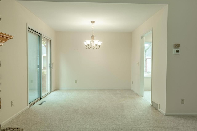 1 Winterberry Trl, Madison, WI 53717 - spare room with light carpet, a chandelier, and baseboards