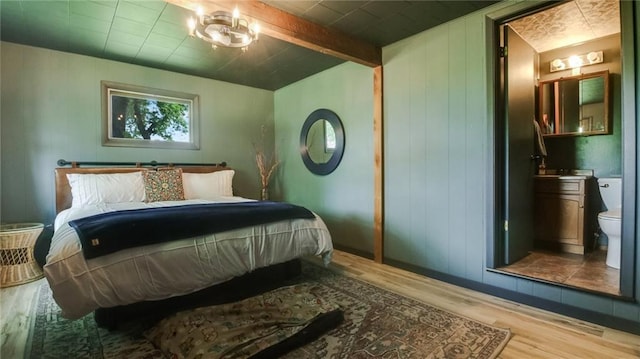 N10221 970th St, Colfax, WI 54730 - bedroom with wood finished floors, beam ceiling, and wooden walls