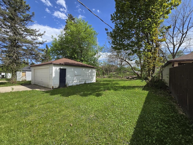 6229 W Keefe Avenue Parkway Unit 6229A, Milwaukee, WI 53216 - view of yard with an outdoor structure and a garage