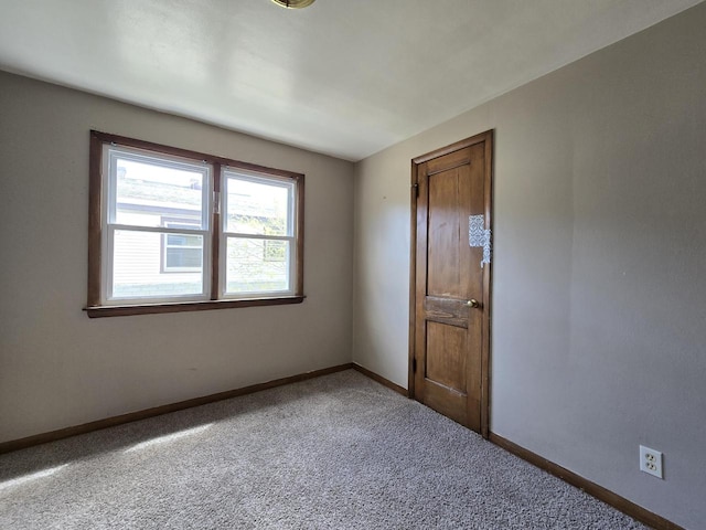 2931 N 58th St, Milwaukee, WI 53210 - carpeted empty room featuring baseboards