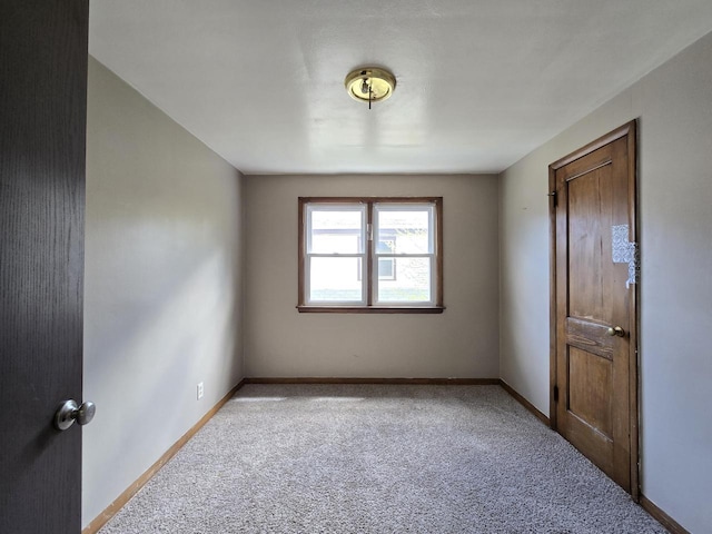 2931 N 58th St, Milwaukee, WI 53210 - carpeted spare room featuring baseboards