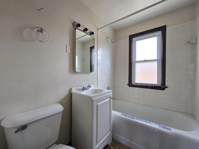 2931 N 58th St, Milwaukee, WI 53210 - full bath featuring vanity, toilet, and tub / shower combination