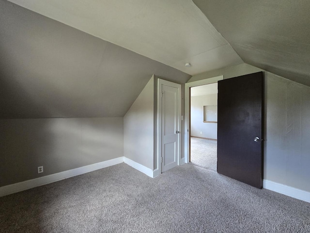 2931 N 58th St, Milwaukee, WI 53210 - additional living space featuring carpet flooring, lofted ceiling, and baseboards