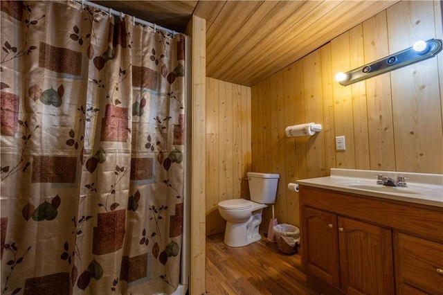 1007 Menasha Ave, Ladysmith, WI 54848 - full bathroom with wood finished floors, vanity, toilet, wooden ceiling, and a shower with shower curtain