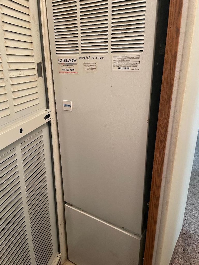 2942 Brentwood Dr, Grand Marsh, WI 53936 - detailed view of a heating unit and carpet