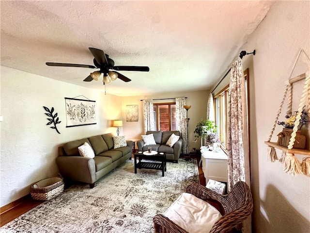 1019 2nd St, Bruce, WI 54819 - living room with a ceiling fan and a textured ceiling