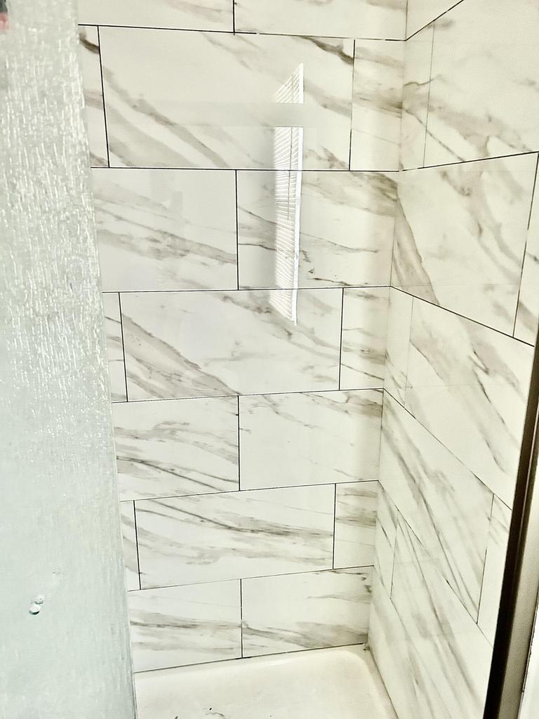 5879 N 29th St, Milwaukee, WI 53209 - bathroom view of tiled shower