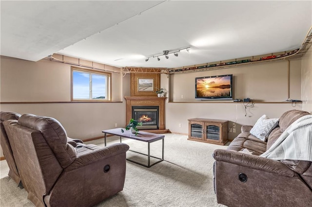 11684 44th Ave, Chippewa Falls, WI 54729 - carpeted living room featuring a glass covered fireplace and baseboards