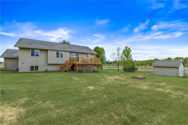 11684 44th Ave, Chippewa Falls, WI 54729 - rear view of property featuring a fire pit, a deck, and a yard