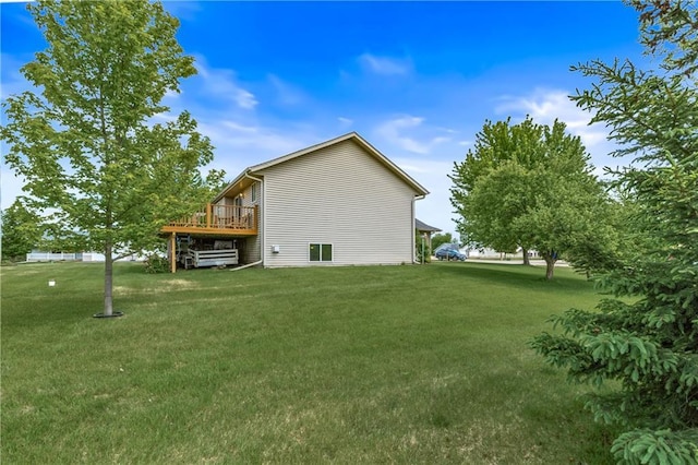 11684 44th Ave, Chippewa Falls, WI 54729 - view of side of home with a yard and a deck
