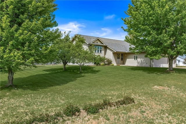 11684 44th Ave, Chippewa Falls, WI 54729 - view of front of house featuring a front yard and a garage