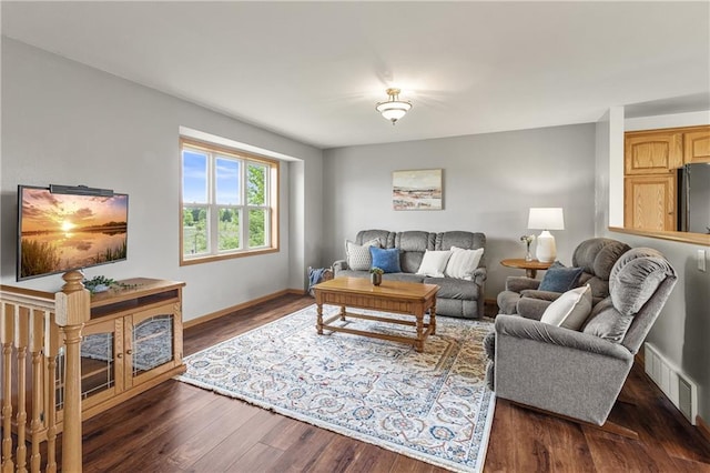 11684 44th Ave, Chippewa Falls, WI 54729 - living area with dark wood-style floors and baseboards
