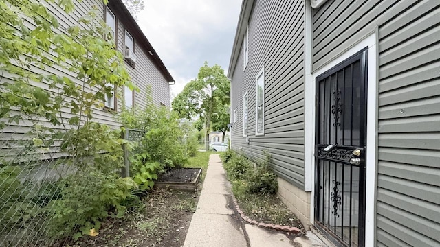 5410 N 37th St, Milwaukee, WI 53209 - view of side of home featuring a vegetable garden