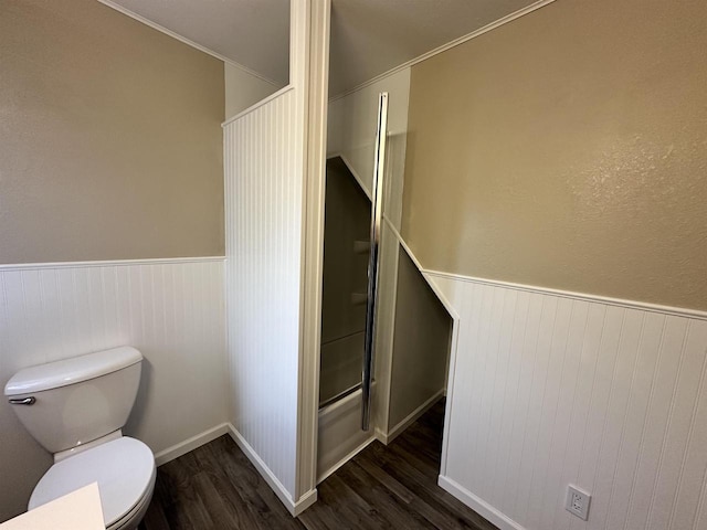 N2224 Wafle Rd, Mauston, WI 53948 - bathroom featuring wood finished floors, a wainscoted wall, and toilet