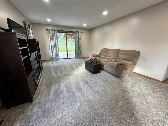 N2224 Wafle Rd, Mauston, WI 53948 - carpeted living room featuring recessed lighting, baseboards, and a fireplace