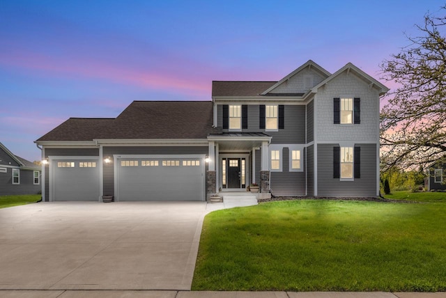 160 Candleberry Ln, Grafton, WI 53024 - view of front of home featuring a garage, concrete driveway, a front lawn, and roof with shingles