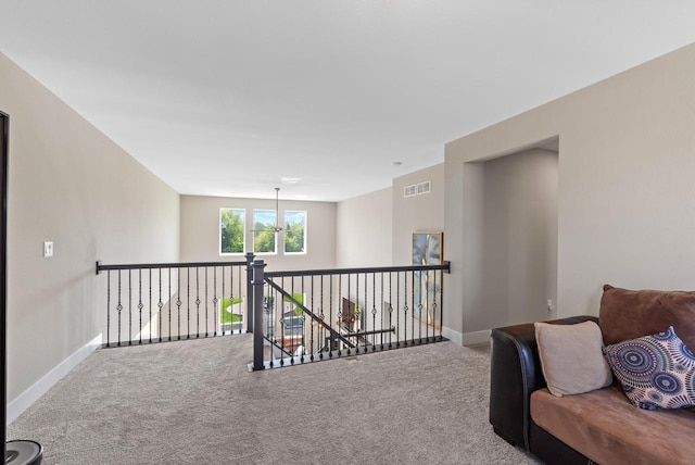 160 Candleberry Ln, Grafton, WI 53024 - sitting room with carpet, baseboards, and an upstairs landing