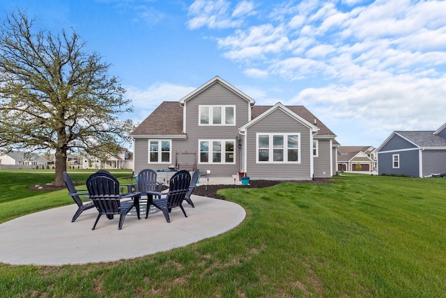 160 Candleberry Ln, Grafton, WI 53024 - back of property with a patio, a lawn, and an outdoor fire pit