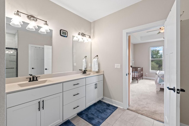 160 Candleberry Ln, Grafton, WI 53024 - full bath featuring double vanity, ensuite bath, tile patterned flooring, ceiling fan, and baseboards