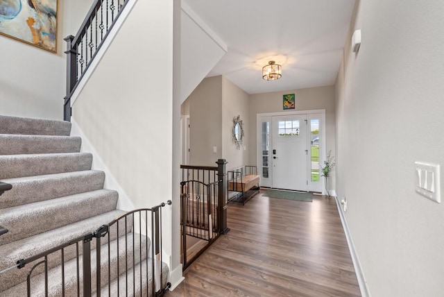 160 Candleberry Ln, Grafton, WI 53024 - entryway featuring wood finished floors, baseboards, and stairway