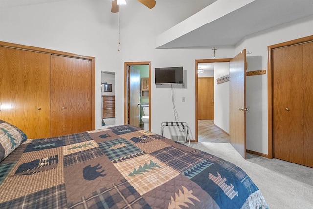 W5204 N Osprey Dr, New Lisbon, WI 53950 - bedroom featuring light carpet, ensuite bathroom, a ceiling fan, and a closet