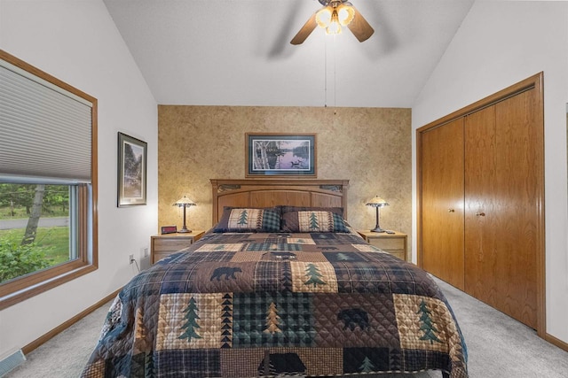 W5204 N Osprey Dr, New Lisbon, WI 53950 - bedroom featuring lofted ceiling, carpet, a closet, ceiling fan, and baseboards
