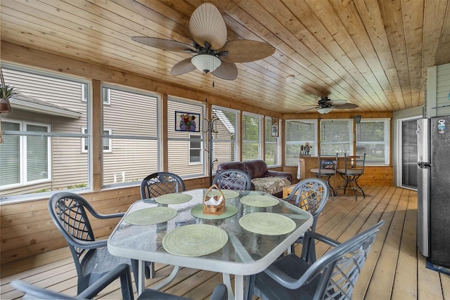 W5204 N Osprey Dr, New Lisbon, WI 53950 - sunroom featuring outdoor dining area, a ceiling fan, and plenty of natural light