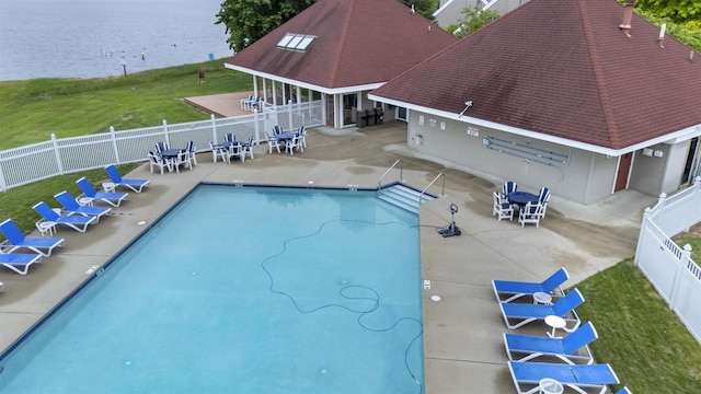 W5204 N Osprey Dr, New Lisbon, WI 53950 - community pool featuring a water view and a patio