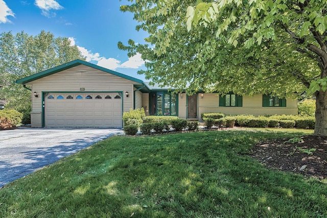 506 Torrey Pines Dr, Twin Lakes, WI 53181 - single story home with driveway, an attached garage, and a front yard