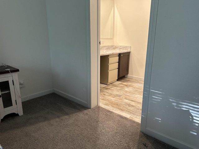 32793 Fulton St, Gotham, WI 53540 - bathroom featuring vanity, carpet, and baseboards