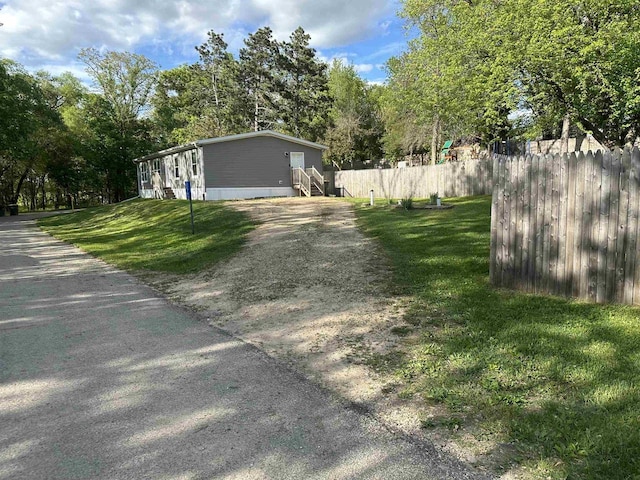32793 Fulton St, Gotham, WI 53540 - view of side of property with view of scattered trees and entry steps