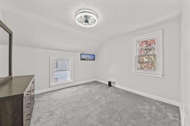 6028 N 38th St, Milwaukee, WI 53209 - bonus room with vaulted ceiling, carpet floors, and baseboards