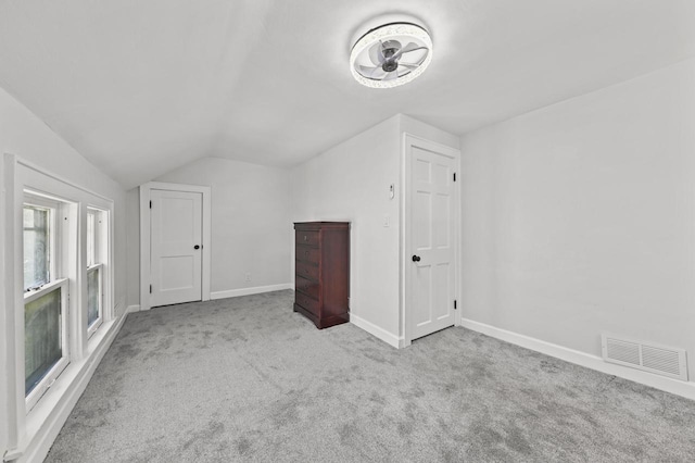 6028 N 38th St, Milwaukee, WI 53209 - bonus room featuring lofted ceiling, carpet, and baseboards