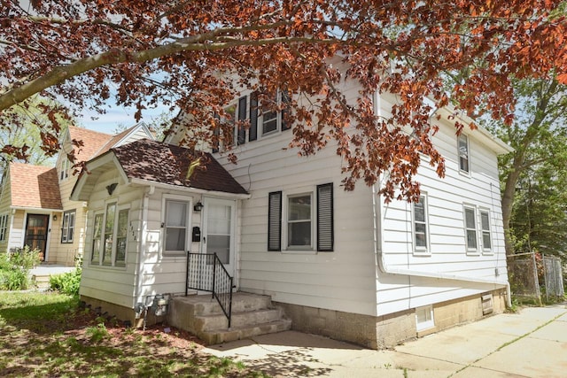 6028 N 38th St, Milwaukee, WI 53209 - view of front of house featuring roof with shingles