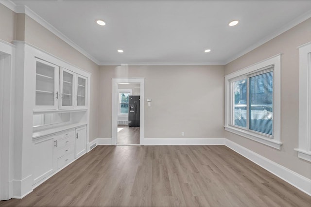 1632 S 77th St, West Allis, WI 53214 - unfurnished room featuring crown molding, wood finished floors, recessed lighting, and baseboards