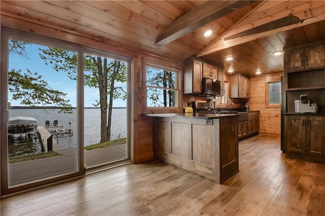 14856W Valhalla Dr, Hayward, WI 54843 - kitchen with appliances with stainless steel finishes, a peninsula, hardwood / wood-style flooring, dark countertops, and wooden ceiling