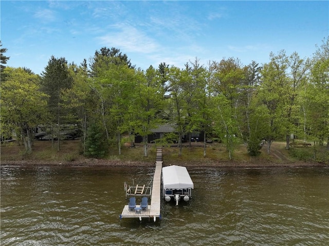 14856W Valhalla Dr, Hayward, WI 54843 - dock area featuring a water view and boat lift