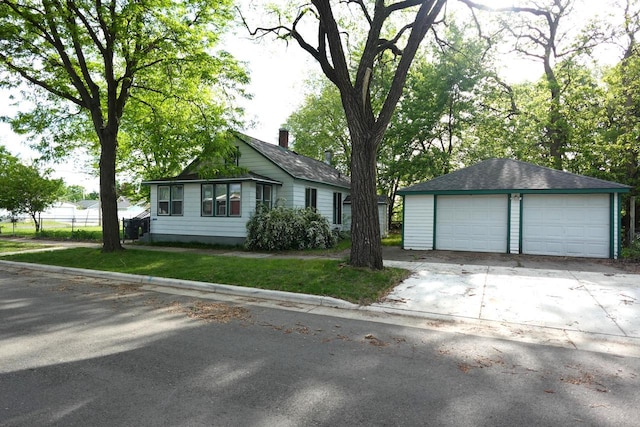 2107 Liberty St, La Crosse, WI 54603 - single story home featuring a garage, an outdoor structure, and a front lawn