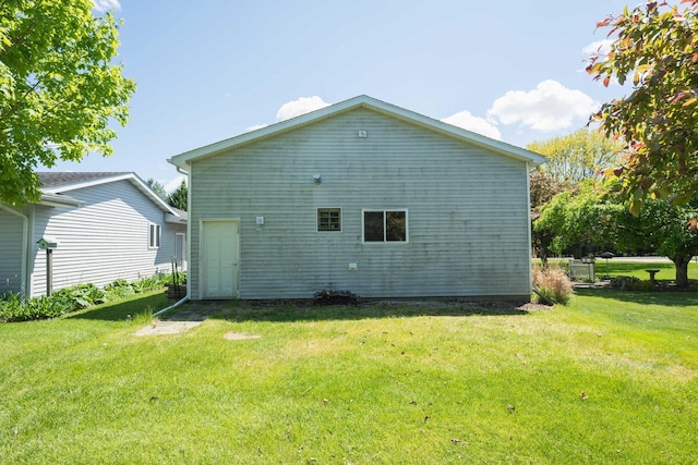 W5670 School Rd, Walworth, WI 53184 - view of side of home with a lawn