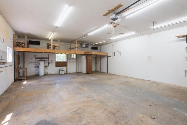W5670 School Rd, Walworth, WI 53184 - garage with a garage door opener