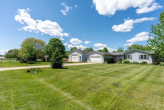W5670 School Rd, Walworth, WI 53184 - view of front facade featuring concrete driveway, a front lawn, and an attached garage
