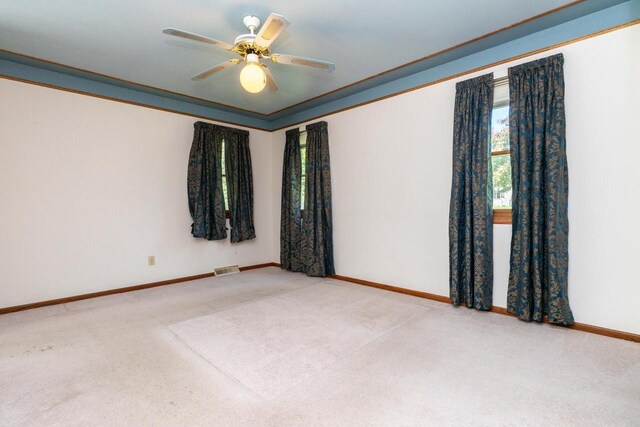 W5670 School Rd, Walworth, WI 53184 - carpeted spare room with plenty of natural light, baseboards, and ceiling fan