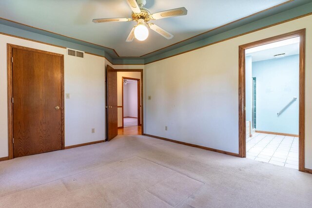 W5670 School Rd, Walworth, WI 53184 - unfurnished bedroom with carpet floors, baseboards, a ceiling fan, and ensuite bath