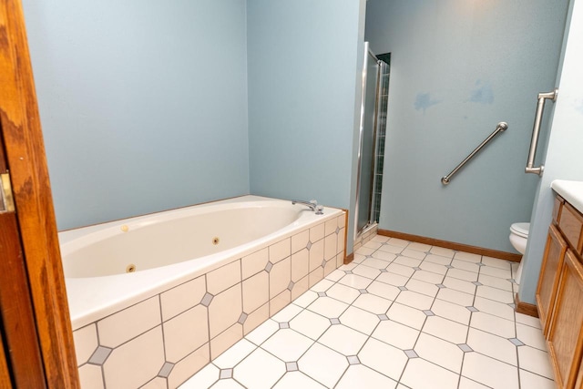 W5670 School Rd, Walworth, WI 53184 - full bath featuring vanity, a jetted tub, a shower stall, and toilet